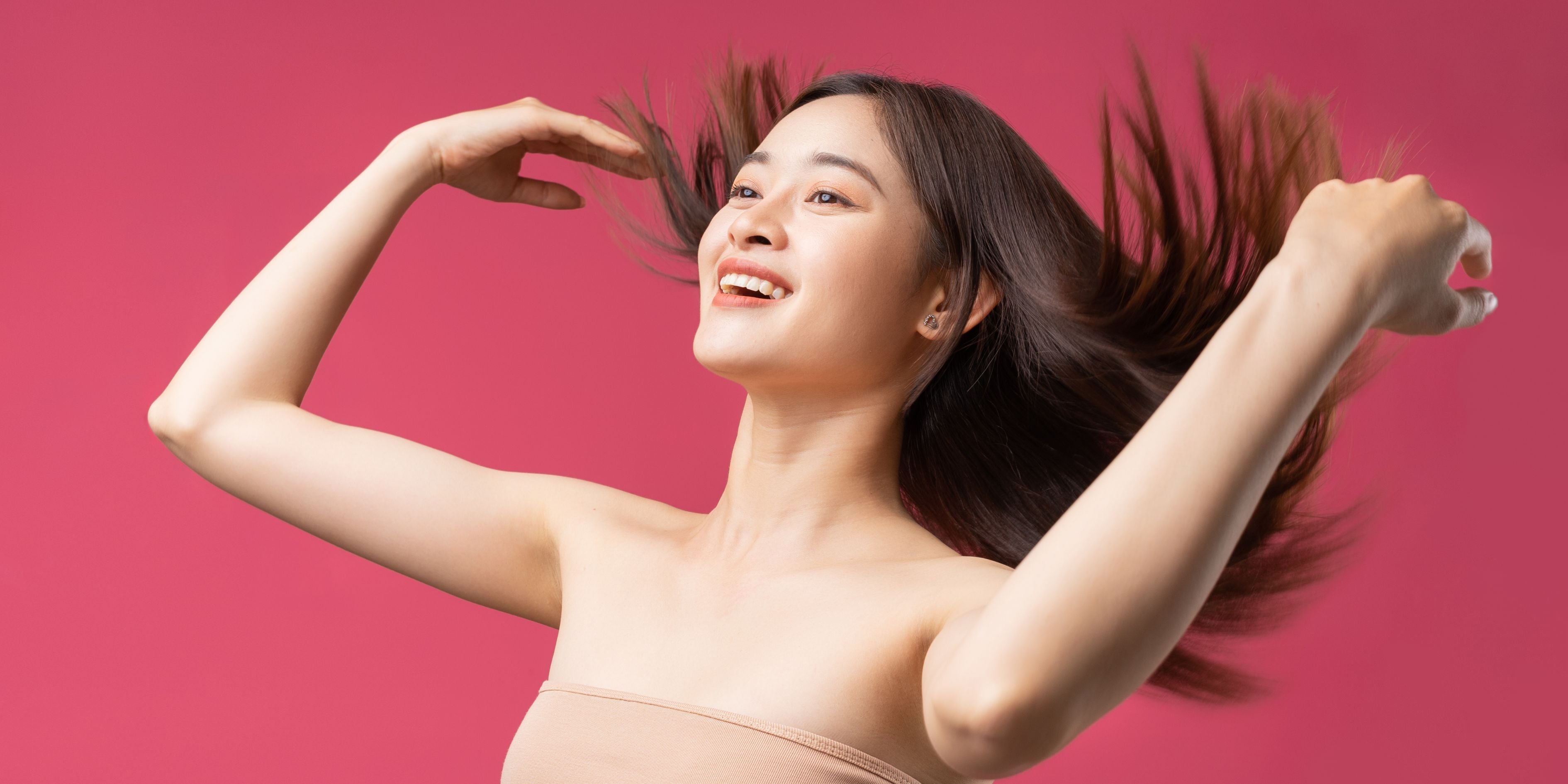 Close-up of a woman with a beautiful, healthy scalp and thick, shiny hair representing the peak of Korean beauty and scalp care.