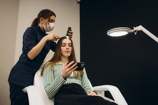 young-woman-visiting-trichologist